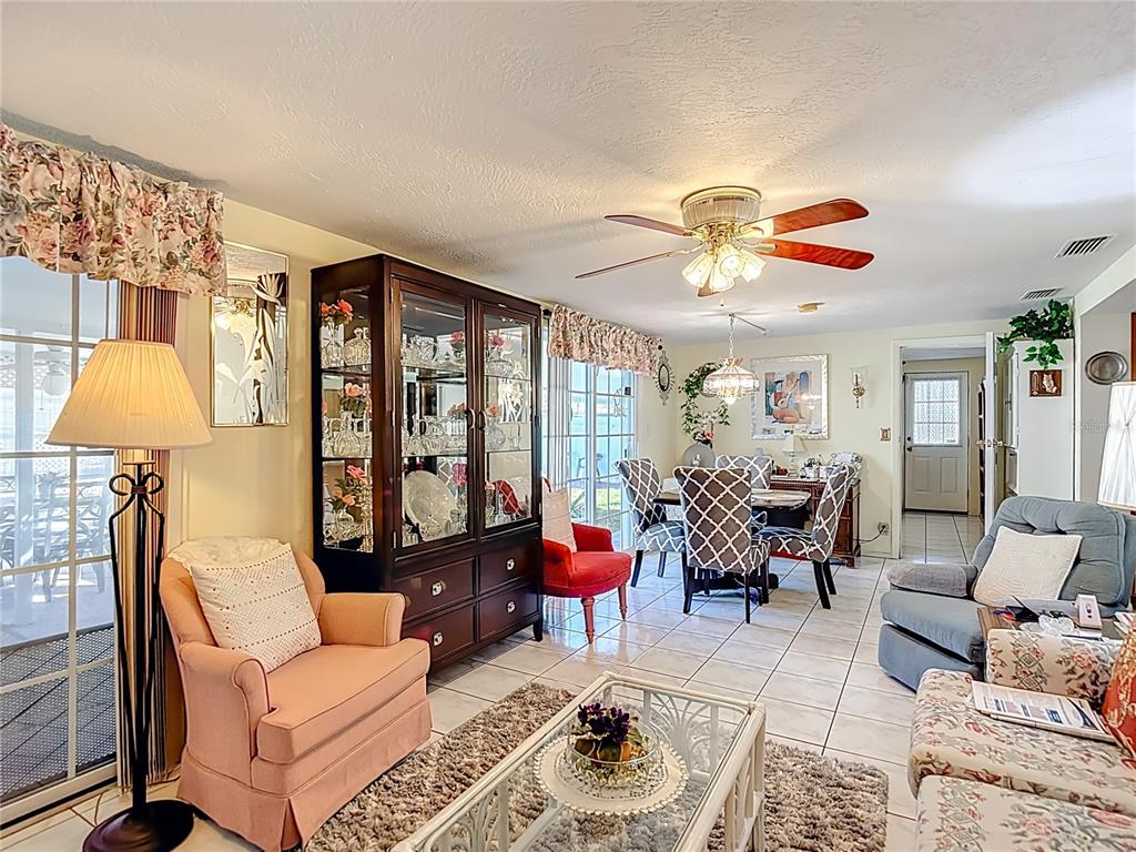 1646 Cockleshell Drive Holiday, FL 34690 - Photo 18 of 36 a living room with furniture and a large window