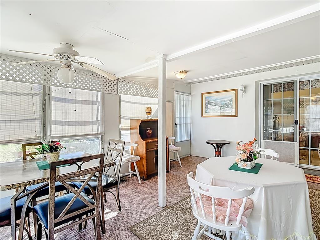 1646 Cockleshell Drive Holiday, FL 34690 - Photo 30 of 36 a dining room with furniture and window