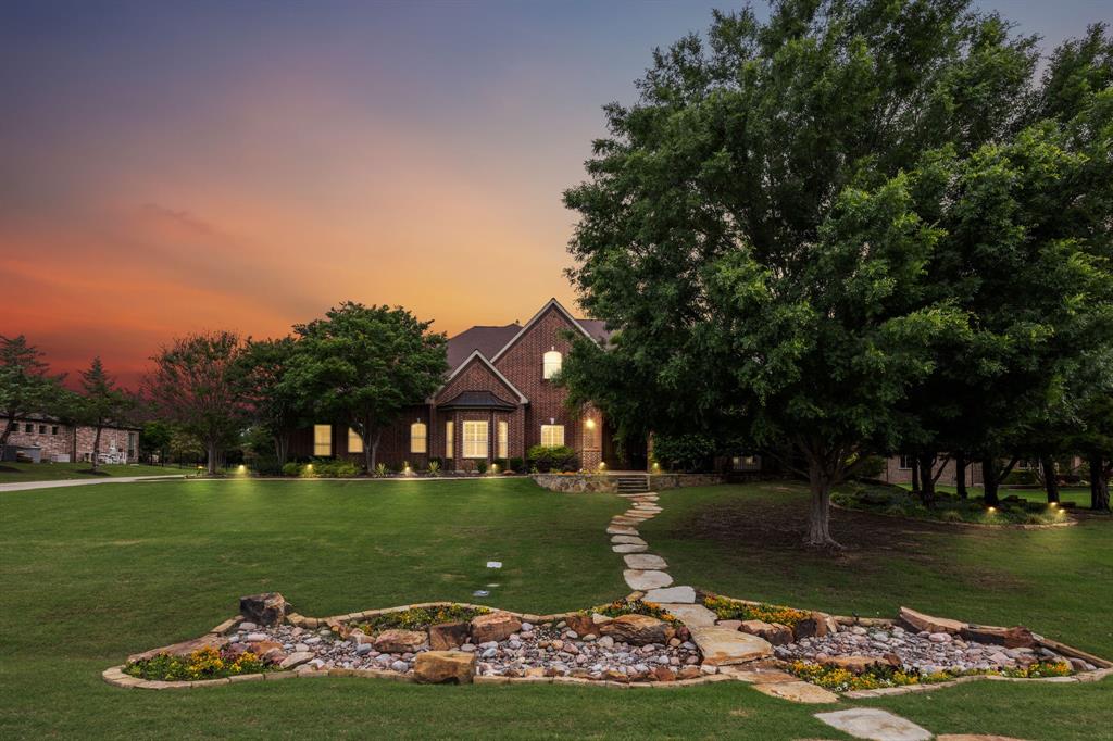a view of a park with large trees