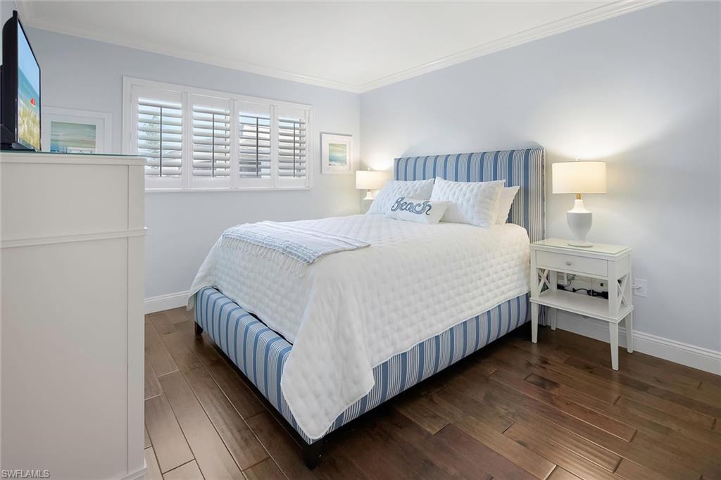 4160 Crayton Road, Unit A5 Naples, FL 34103 - Photo 15 of 46 Comfortable guest suite offering a tranquil lake view