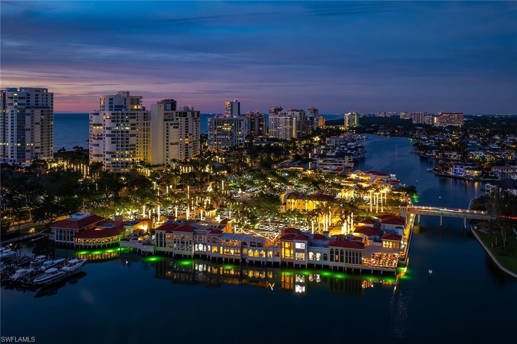 4160 Crayton Road, Unit A5 Naples, FL 34103 - Photo 19 of 46 Just steps from Venetian Village with twinkly night views