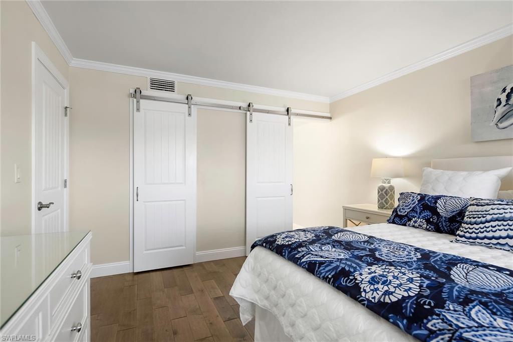 4160 Crayton Road, Unit A5 Naples, FL 34103 - Photo 28 of 46 Barn doors add both charm and convenience