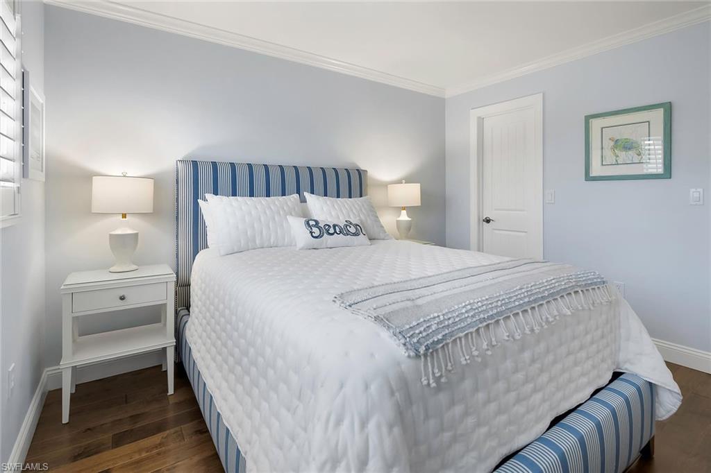 4160 Crayton Road, Unit A5 Naples, FL 34103 - Photo 30 of 46 Guest bedroom with spacious California walk-in closet