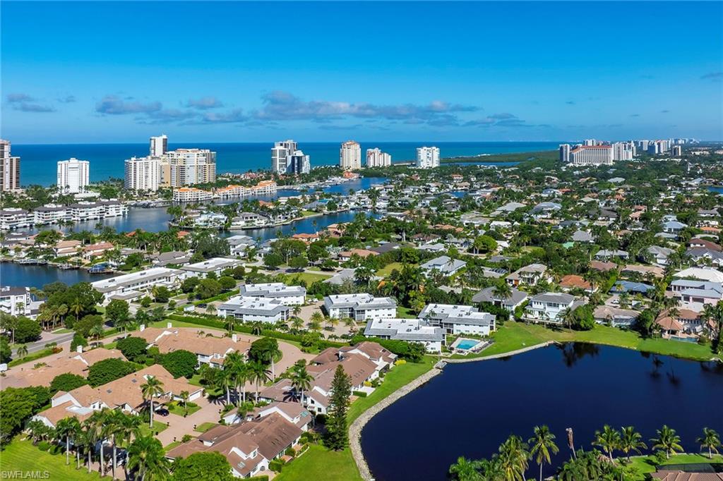 4160 Crayton Road, Unit A5 Naples, FL 34103 - Photo 34 of 46 Aerial view northwest across Venetian Bay and the Gulf