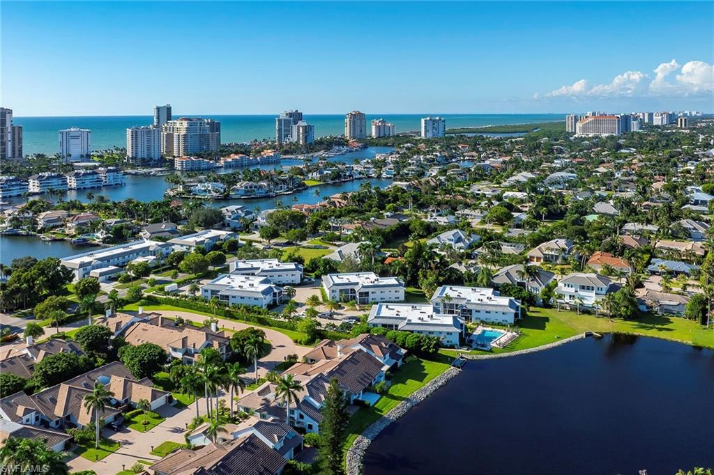 4160 Crayton Road, Unit A5 Naples, FL 34103 - Photo 36 of 46 Aerial looking towards Clam Pass Beach Park and The Naples Grande