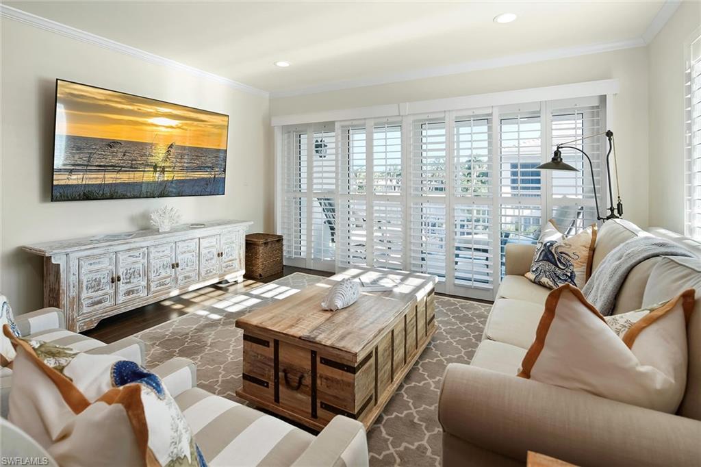 4160 Crayton Road, Unit A5 Naples, FL 34103 - Photo 10 of 46 Plantation shutters throughout add charm