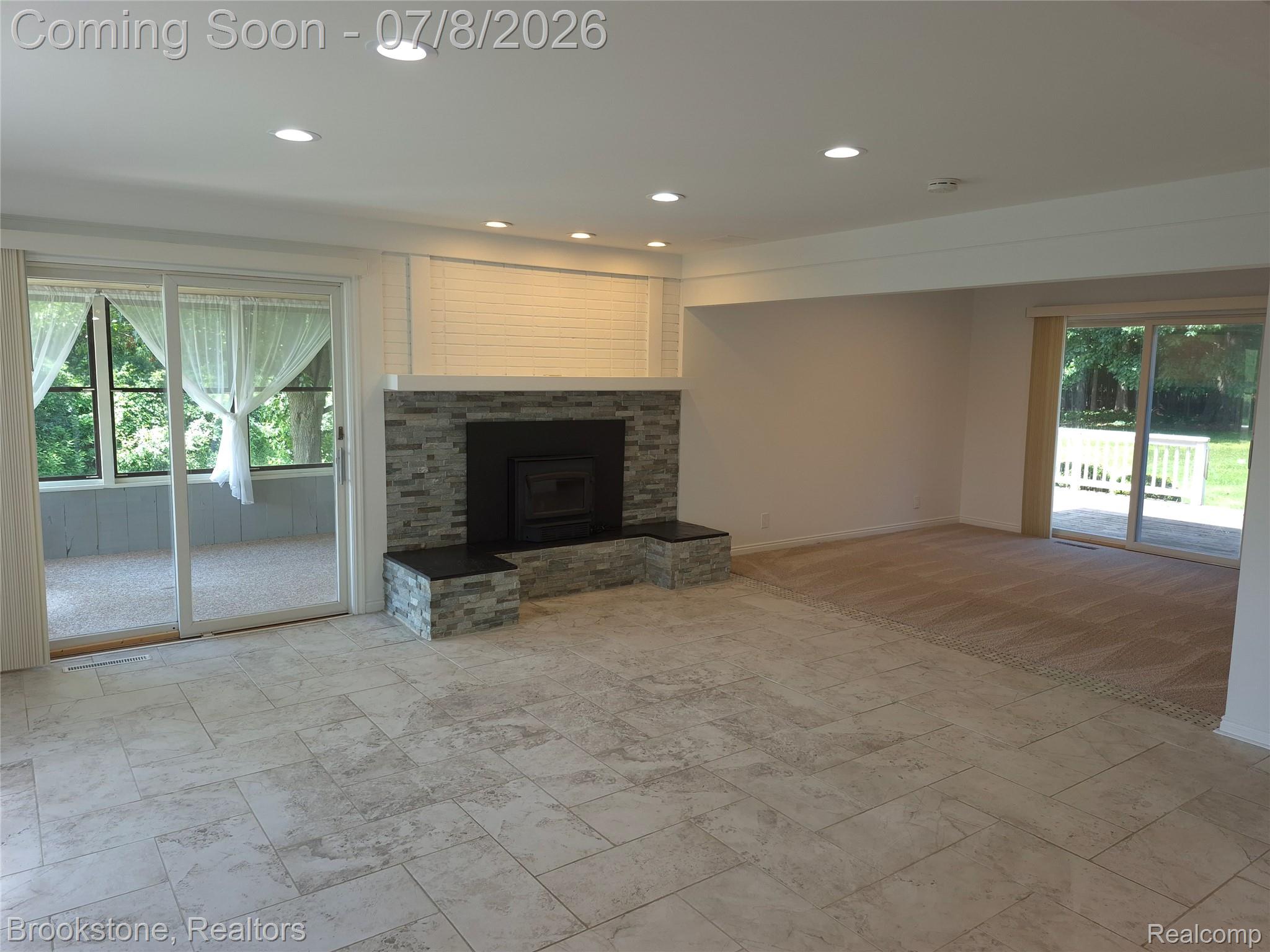 4140 South Henderson Road Davison, MI 48423 - Photo 30 of 98 Spacious interior featuring large format tile flooring and recessed lighting