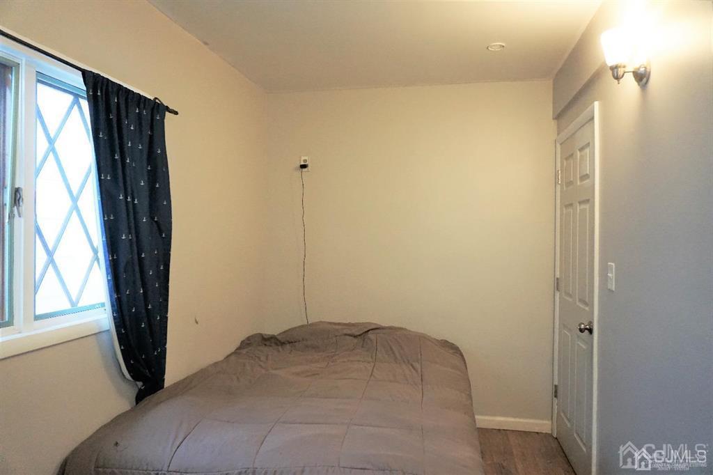 559 Johnstone Street Perth Amboy, NJ 08861 - Photo 8 of 24 a view of a room with a large window