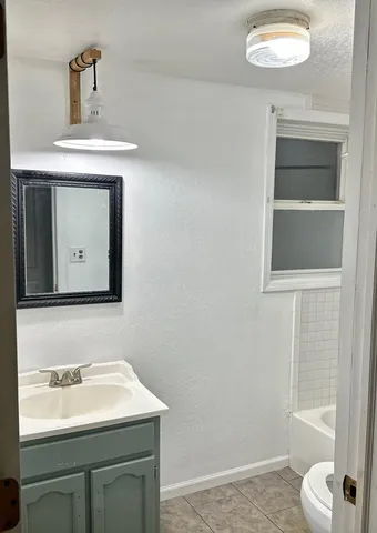 a bathroom with a bathtub