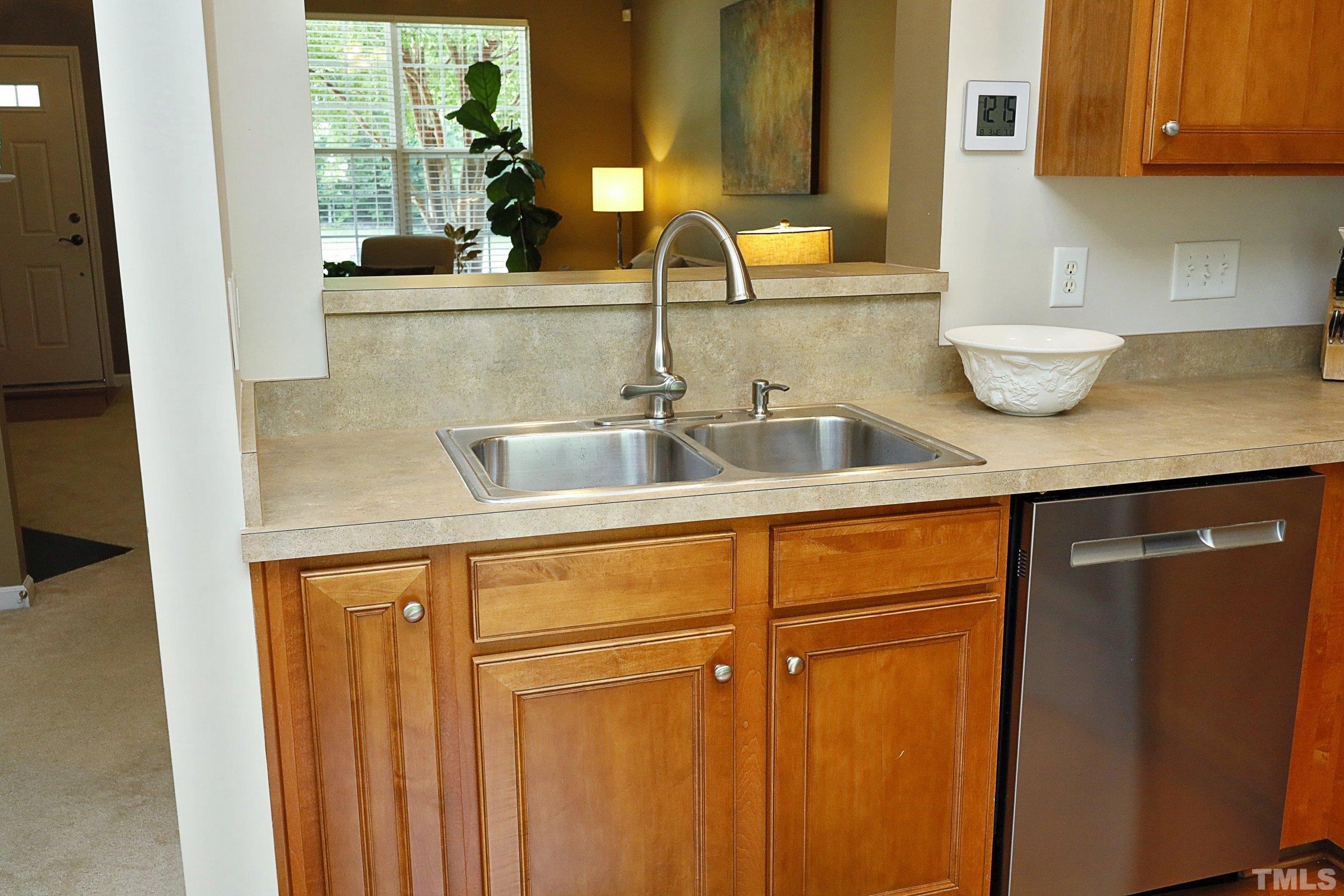 304 Red Elm Drive Durham, NC 27713 - Photo 12 of 27 a close view of two sink and a mirror