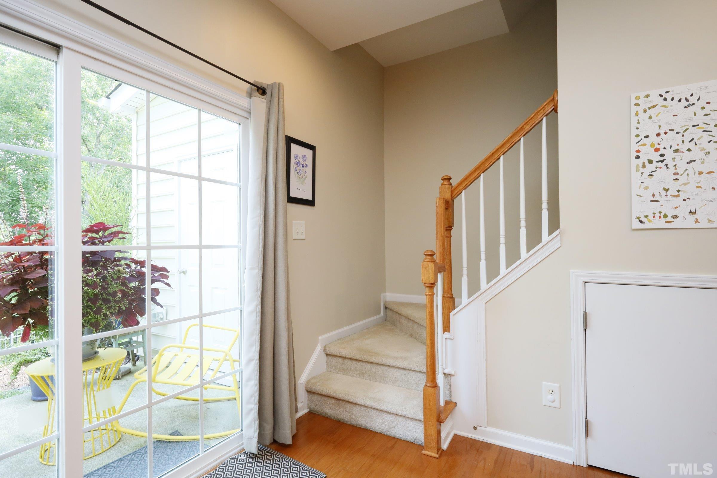 304 Red Elm Drive Durham, NC 27713 - Photo 14 of 27 a view of an entryway with wooden floor