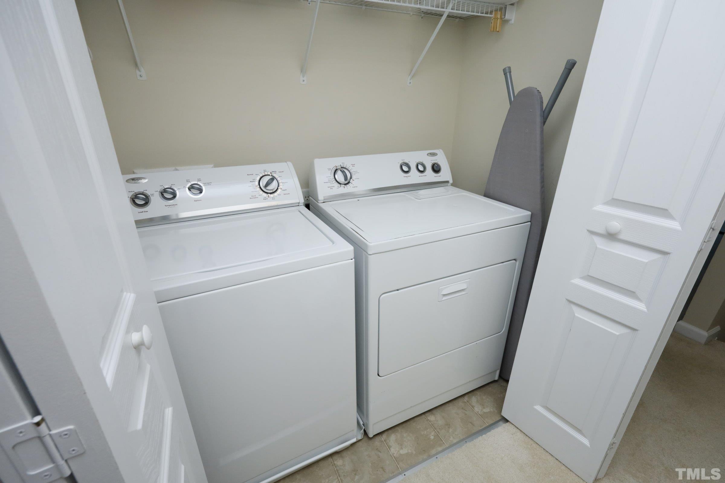 304 Red Elm Drive Durham, NC 27713 - Photo 20 of 27 a utility room with dryer and washer