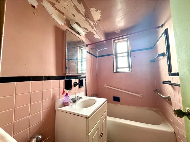 a bathroom with a sink and a bathtub