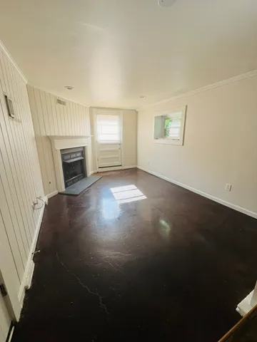 an empty room with windows