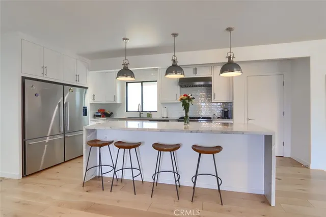 a view of a room with a floor to ceiling window