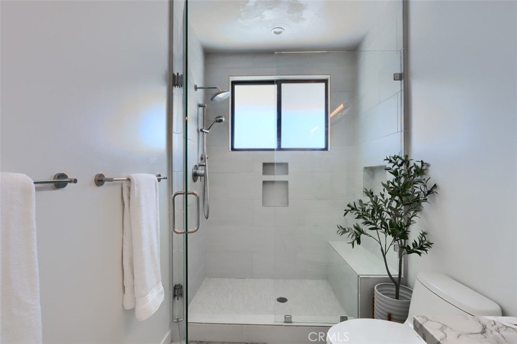 5076-5076 Allred Road Mariposa, CA 95338 - Photo 31 of 75 a bathroom with a shower a toilet and a sink