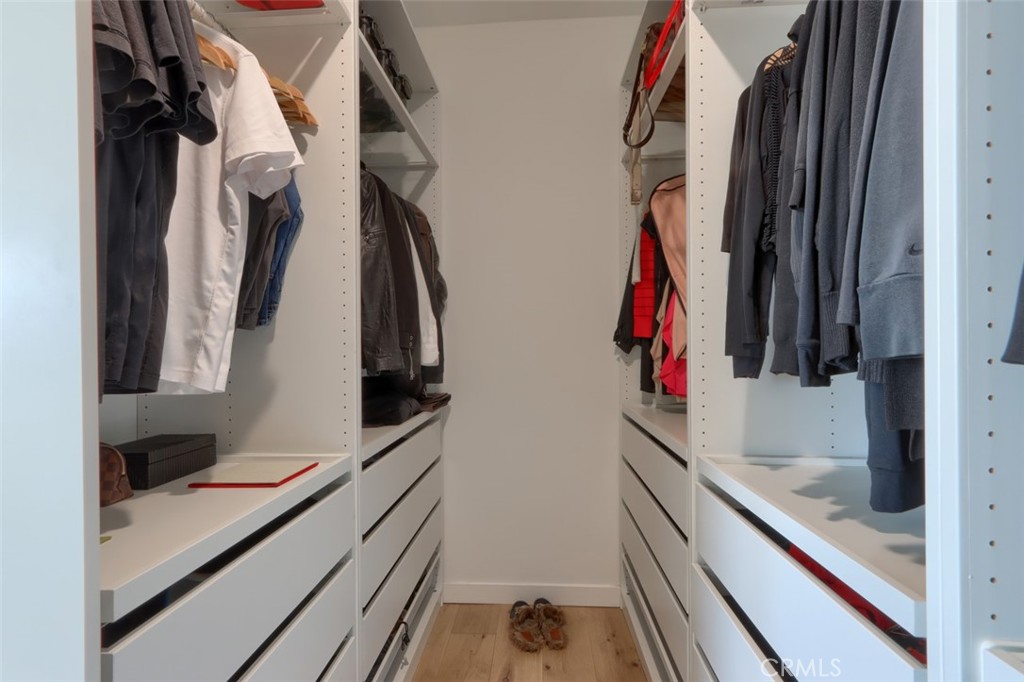 5076-5076 Allred Road Mariposa, CA 95338 - Photo 34 of 75 a view of walk in closet with clothes and shoes