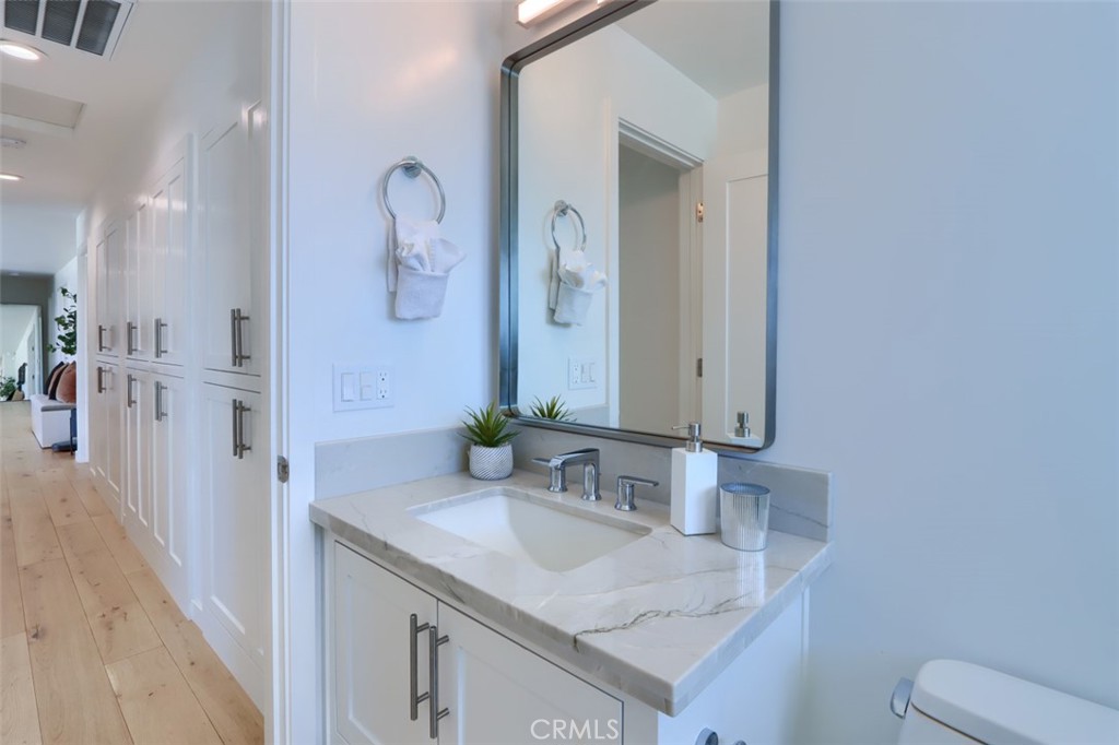 5076-5076 Allred Road Mariposa, CA 95338 - Photo 39 of 75 a bathroom with a granite countertop sink and a mirror