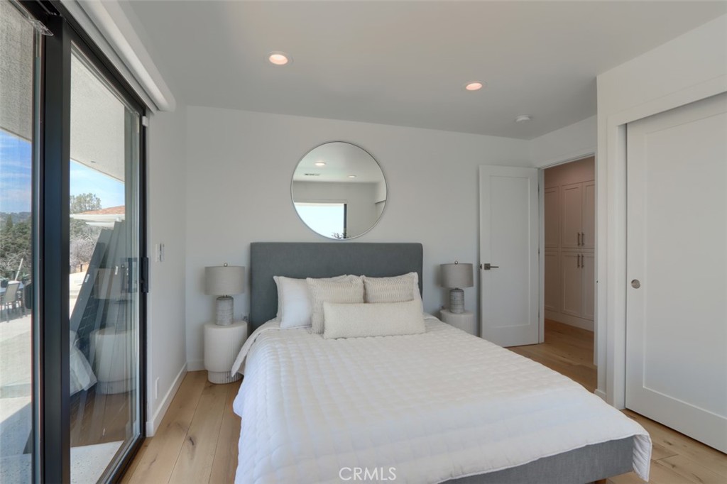 5076-5076 Allred Road Mariposa, CA 95338 - Photo 52 of 75 a bedroom with a bed and a mirror