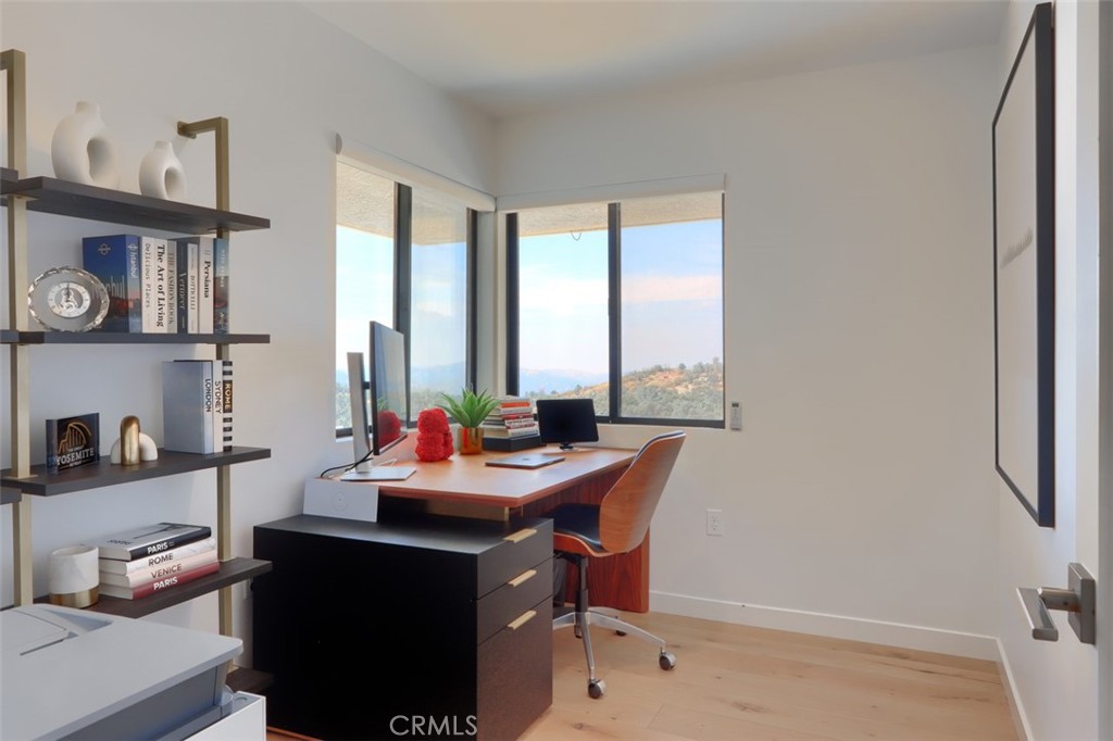 5076-5076 Allred Road Mariposa, CA 95338 - Photo 53 of 75 a view of a workspace with furniture and a window
