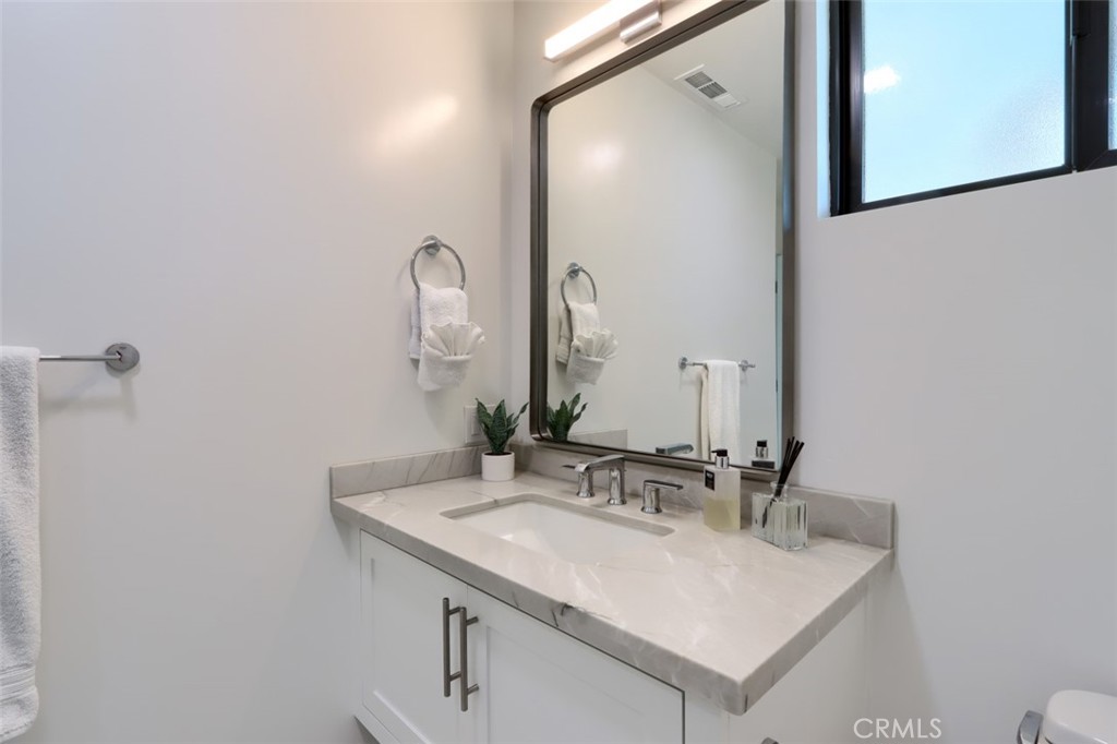 5076-5076 Allred Road Mariposa, CA 95338 - Photo 57 of 75 a bathroom with a sink and a mirror