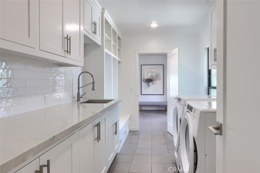 5076-5076 Allred Road Mariposa, CA 95338 - Photo 58 of 75 a kitchen with a sink and cabinets