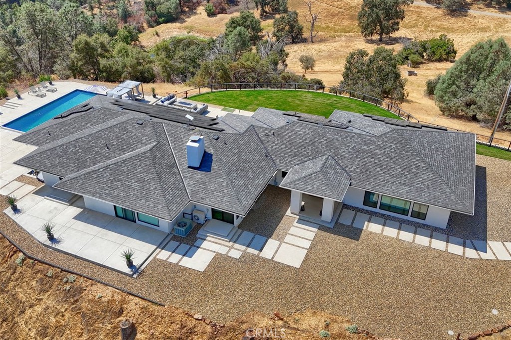5076-5076 Allred Road Mariposa, CA 95338 - Photo 73 of 75 an aerial view of a house with a yard and a garage
