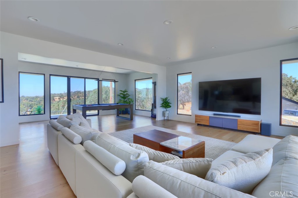 5076-5076 Allred Road Mariposa, CA 95338 - Photo 9 of 75 a living room with furniture and a flat screen tv