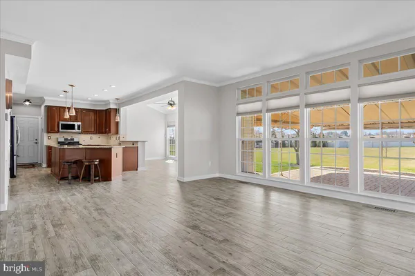 a view of staircase with wooden floor and stairs