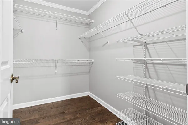 a front view of a house with a sitting area