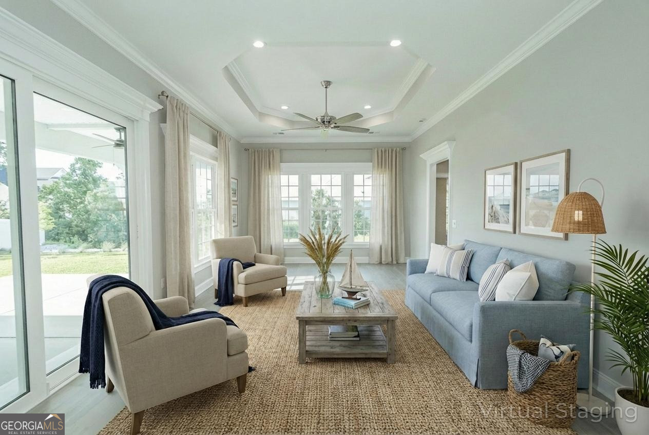 205 Riley Hunter Drive Kingsland, GA 31548 - Photo 16 of 81 a living room with furniture and a large window