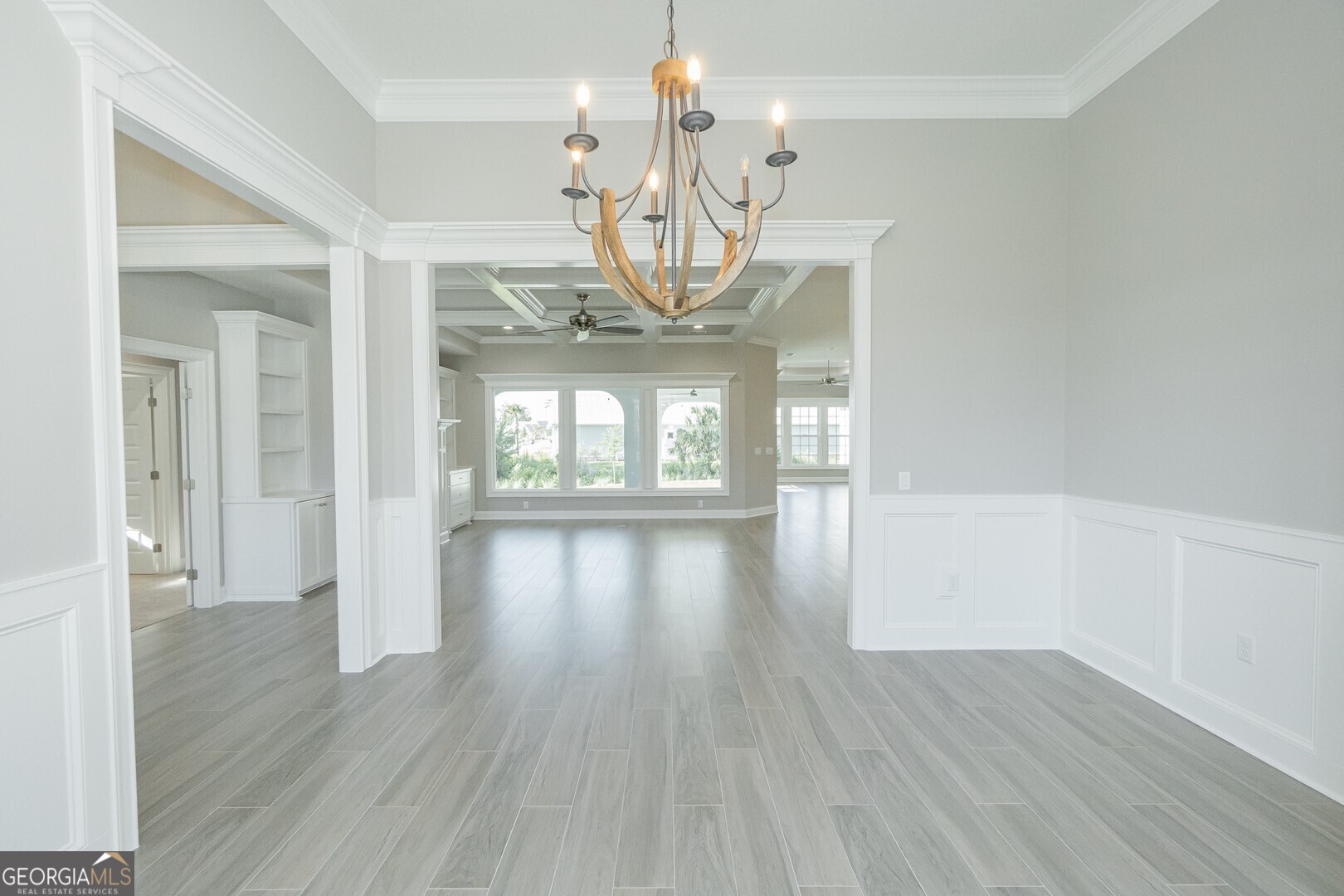205 Riley Hunter Drive Kingsland, GA 31548 - Photo 22 of 81 a view of an empty room with wooden floor and a window