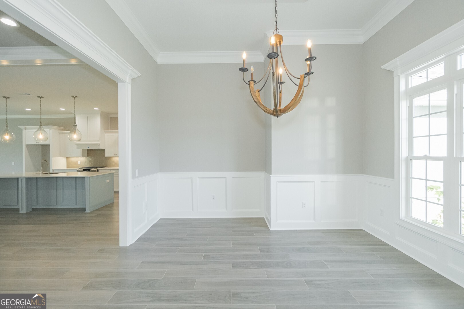 205 Riley Hunter Drive Kingsland, GA 31548 - Photo 23 of 81 a view of a room with wooden floor and windows