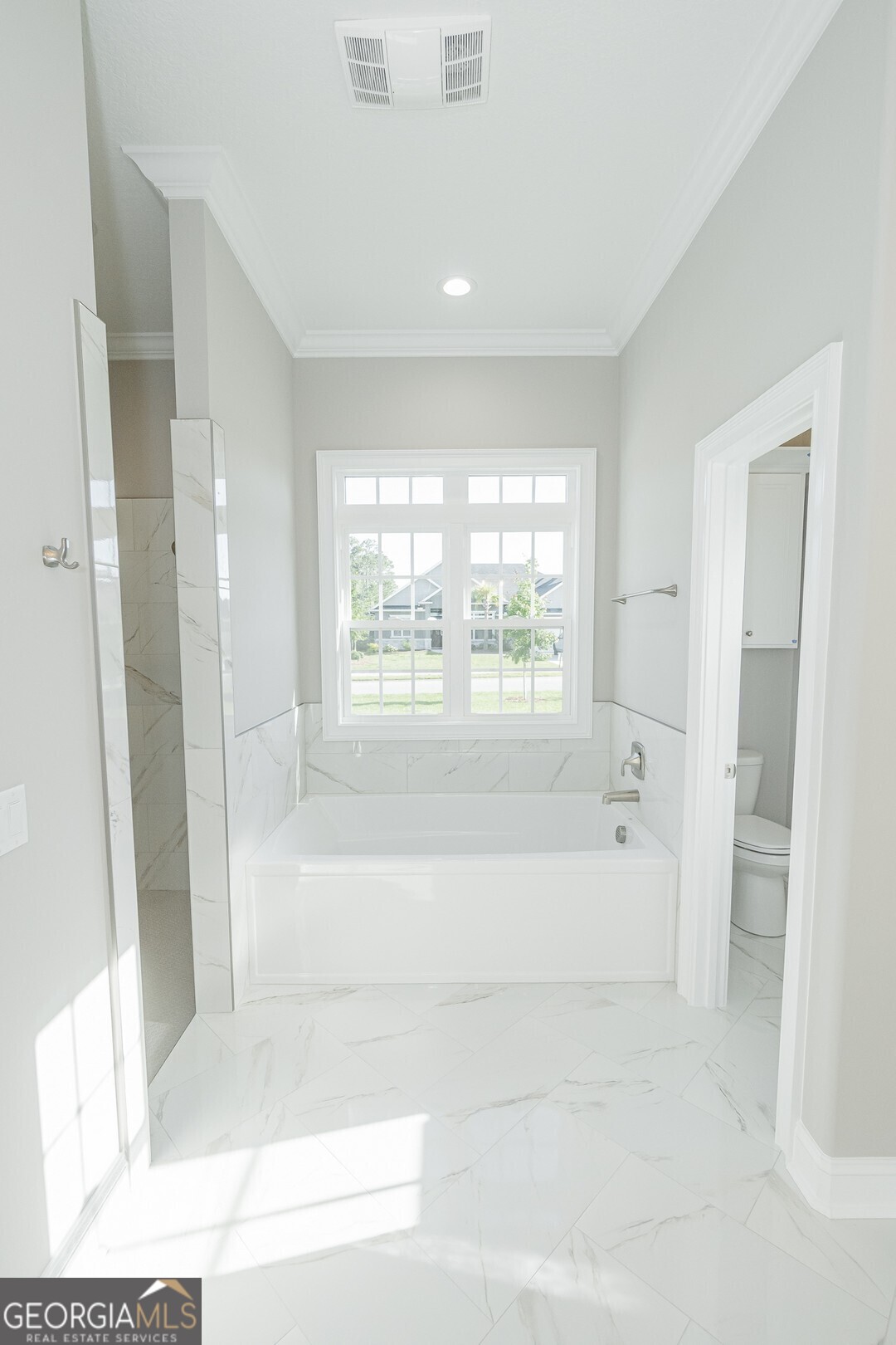 205 Riley Hunter Drive Kingsland, GA 31548 - Photo 37 of 81 a bathroom with a bathtub and a shower