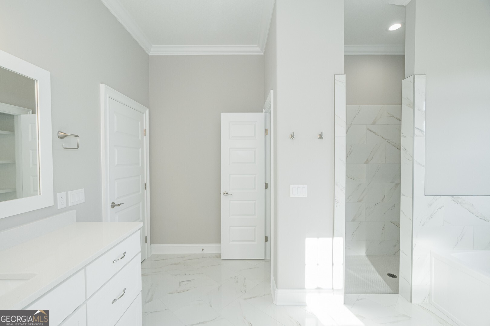 205 Riley Hunter Drive Kingsland, GA 31548 - Photo 39 of 81 a bathroom with a granite countertop sink a mirror and a shower