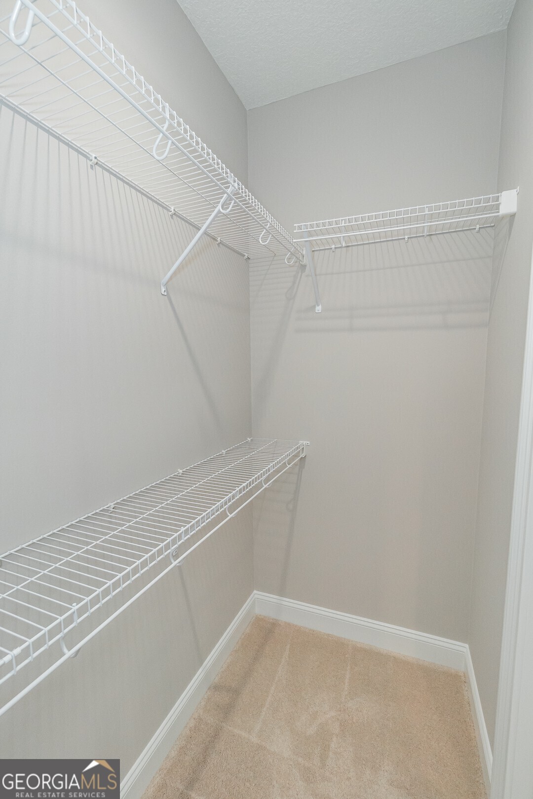 205 Riley Hunter Drive Kingsland, GA 31548 - Photo 48 of 81 a view of a room with racks on the wall