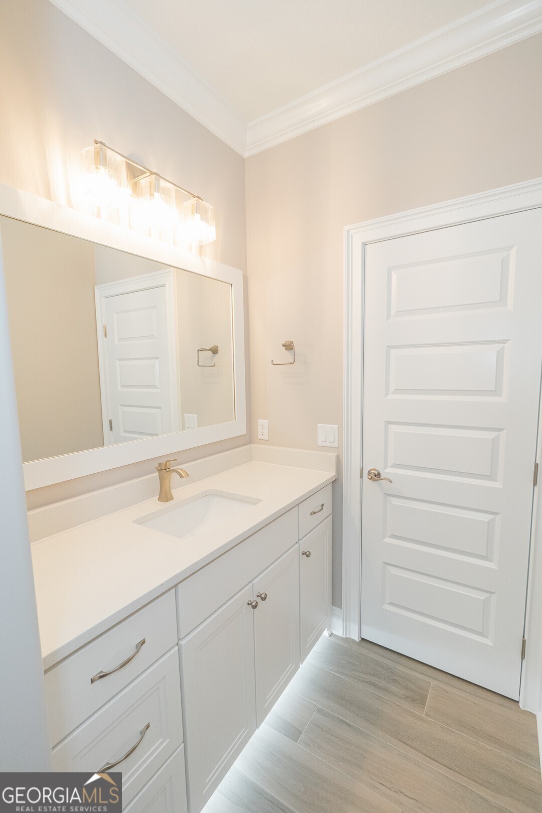 205 Riley Hunter Drive Kingsland, GA 31548 - Photo 59 of 81 a bathroom with a sink and a mirror