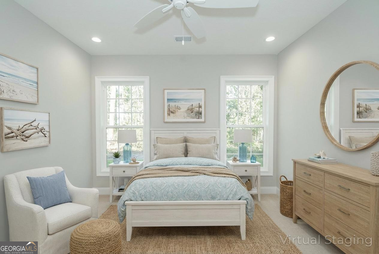 205 Riley Hunter Drive Kingsland, GA 31548 - Photo 60 of 81 a bedroom with a bed a couch and window