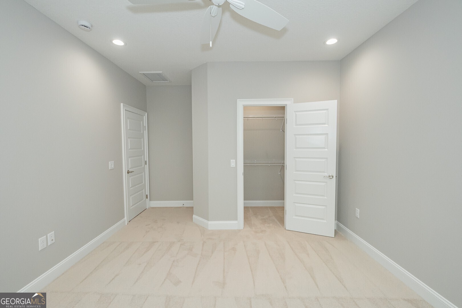 205 Riley Hunter Drive Kingsland, GA 31548 - Photo 62 of 81 an empty room with closet and entryway