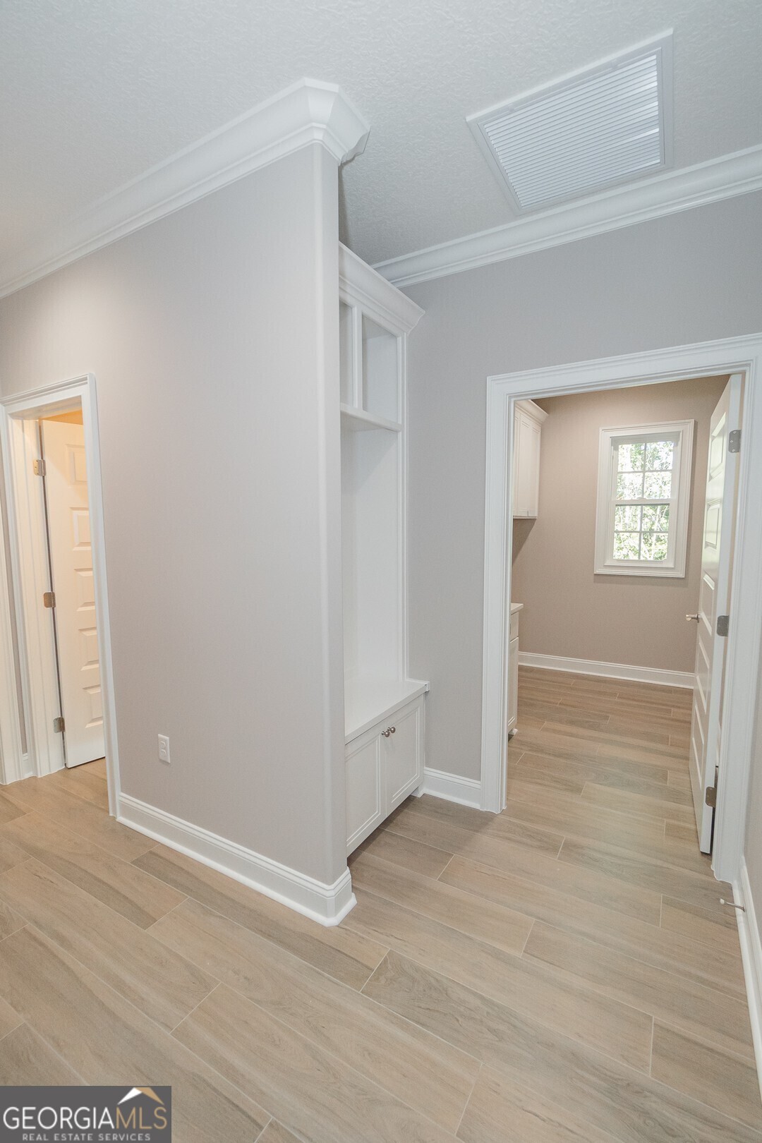 205 Riley Hunter Drive Kingsland, GA 31548 - Photo 64 of 81 an empty room with wooden floor and windows