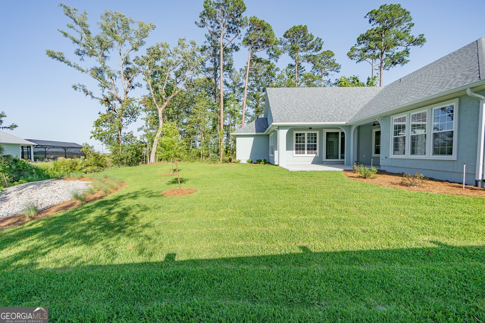 205 Riley Hunter Drive Kingsland, GA 31548 - Photo 78 of 81 a front view of house with yard and green space