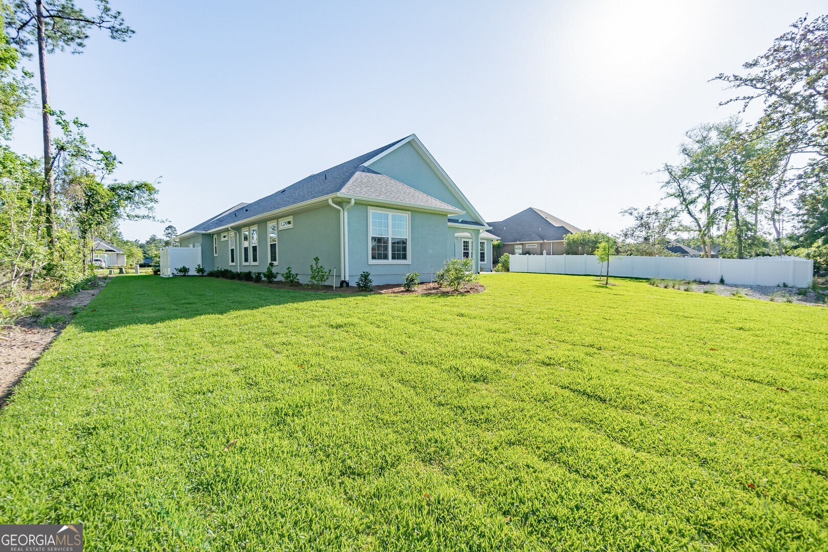 205 Riley Hunter Drive Kingsland, GA 31548 - Photo 81 of 81 a view of a house with a yard and sitting area