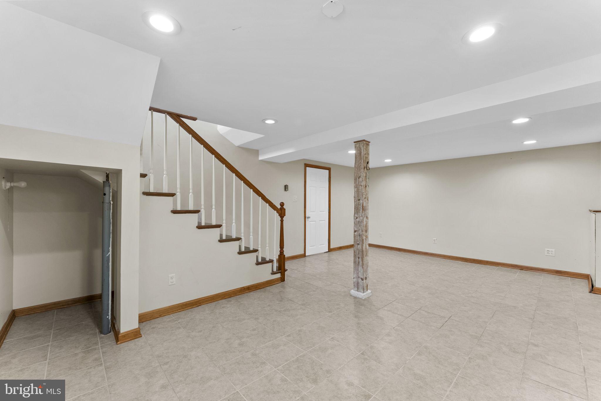 539 Old Meetze Road Warrenton, VA 20186 - Photo 23 of 30 a view of an empty room with stairs