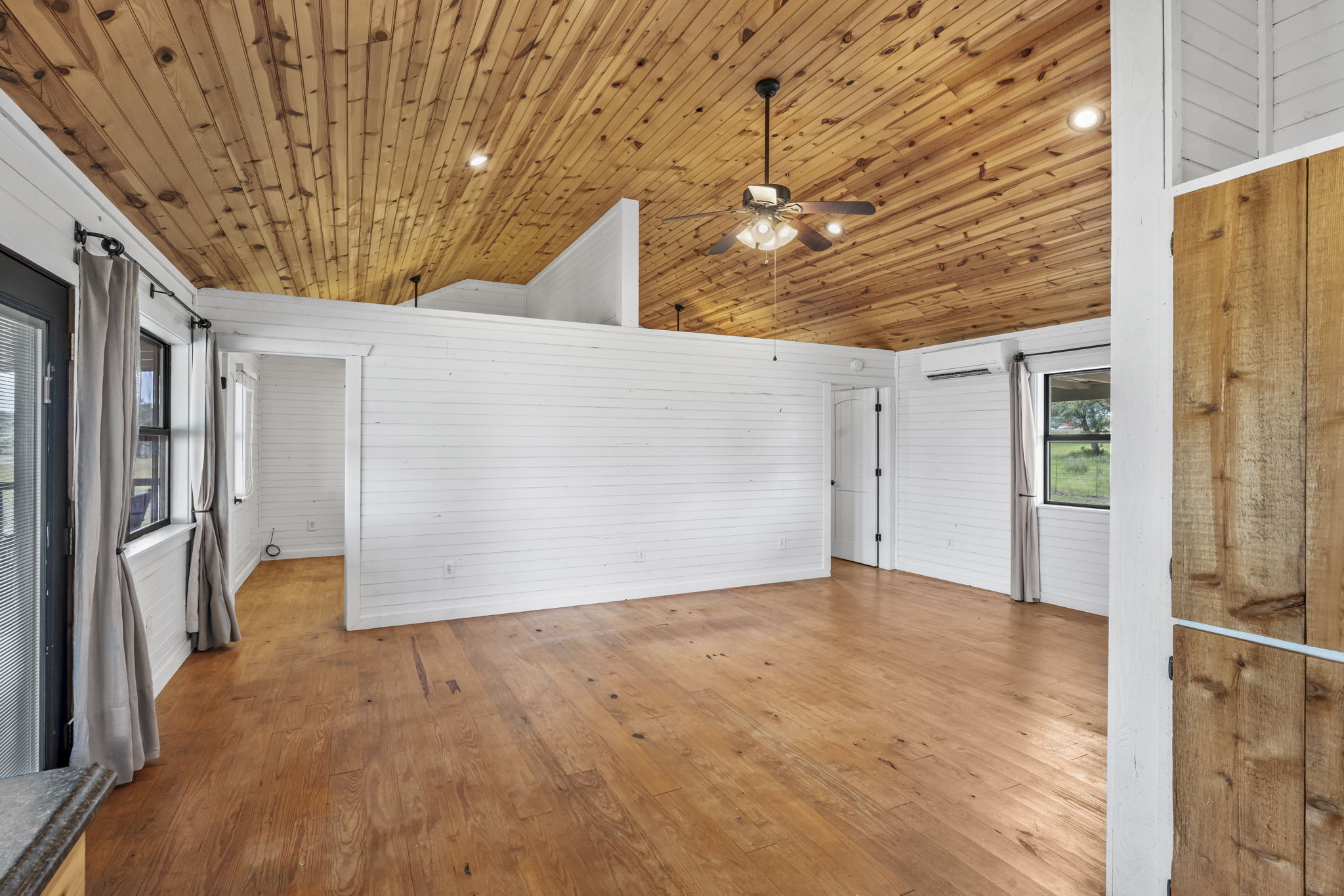 225 Ischar Lane Mason, TX 76856 - Photo 14 of 37 a view of empty room with wooden floor