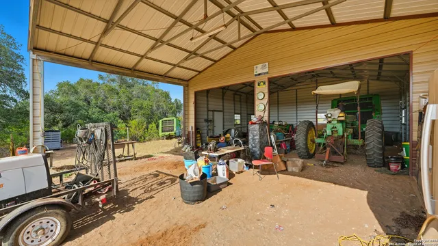 a view of swimming pool with outdoor seating