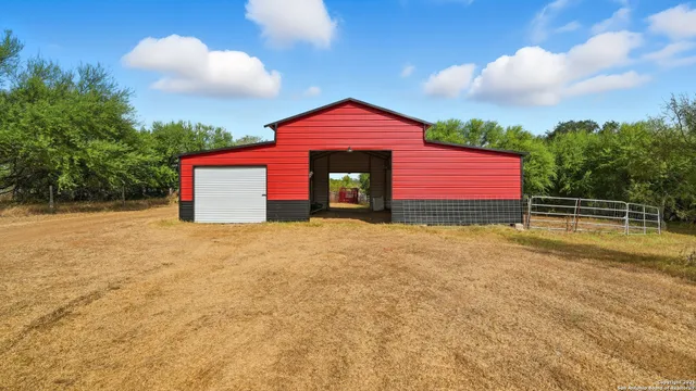 a view of a backyard with porch