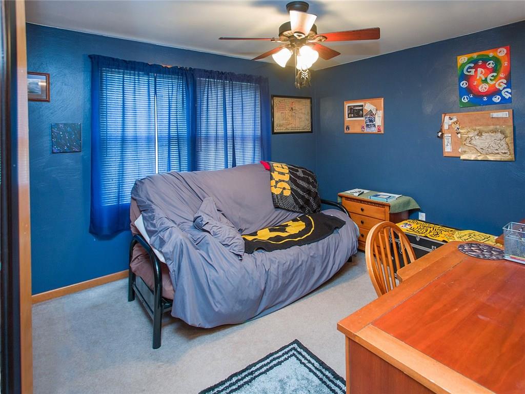 618 Cemetery Road Perryopolis, PA 15473 - Photo 14 of 25 Bedroom with a paddle fan and large closet.