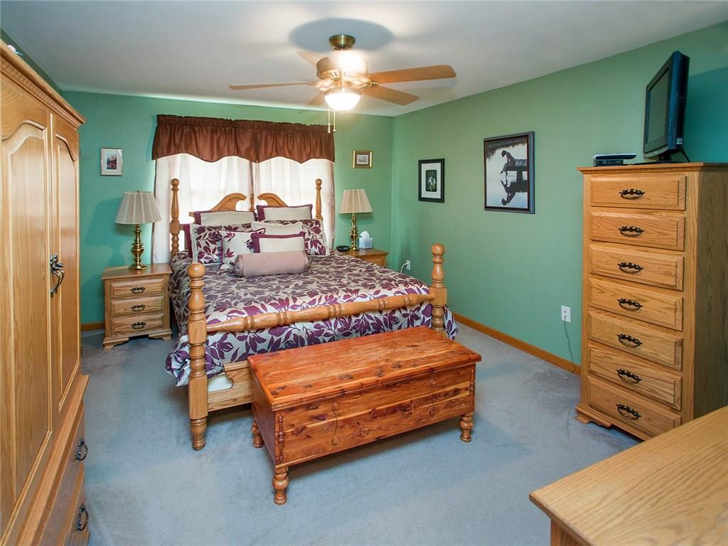 618 Cemetery Road Perryopolis, PA 15473 - Photo 15 of 25 Master bedroom has a paddle fan, large walk in closet and beautiful full bathroom steps away.