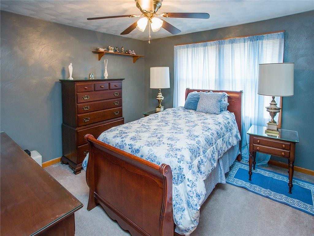 618 Cemetery Road Perryopolis, PA 15473 - Photo 19 of 25 Bedroom with a paddle fan and large closet.