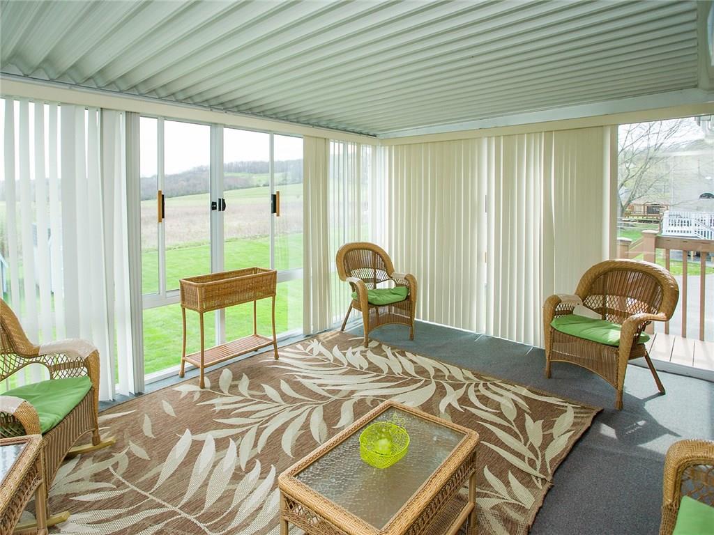 618 Cemetery Road Perryopolis, PA 15473 - Photo 3 of 25 Patio enclosure offers a panoramic view.
